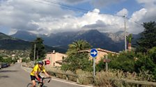 A cyclist heading out of Soller