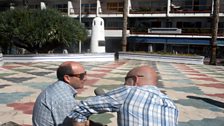 Chatting by the statue