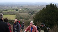 The Edward Thomas Fellowship walkers reach Helen and Edward Thomas' Shoulder of Mutton hill, Steep and the Thomas memorial