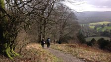 Deryn and Alison walk down the Shoulder of Mutton hill, Steep, Hampshire