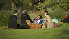 Opera goers enjoy a traditional picnic in the grounds during the interval