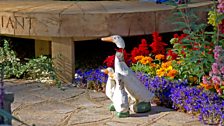 Jemima Puddleduck beside the central bench