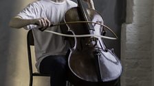 Cellist Oliver Coates with the curved bow he used playing Anna Meredith’s piece ‘Blackfriars Bridge