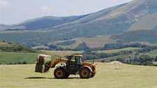 Gathering hay at Mynachdy Hill farm near Machynlleth, West Wales; Courtesy of Gerry Hunt