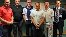 The Manchester United Legends stand with Gerry Kelly