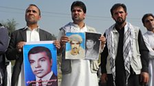 Mourners -relatives of men executed in 1978-79