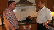 John Toal and Bharat Sharma in his kitchen