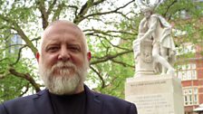 Simon Russell Beale in front of the Shakespeare statue in Leicester Square