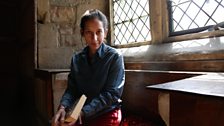 Bidisha at Haddon Hall, Derbyshire, with her personal copy of Jane Eyre