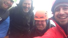 Soggy day on Ben Nevis, Chris Sleight watching the botany survey team at work.