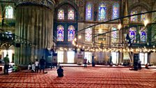 Prayer at the Blue Mosque in Istanbul.