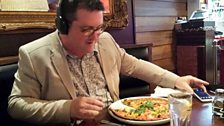 John Toal enjoying a Punjabi style Pizza