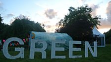 A very green Green Man sign