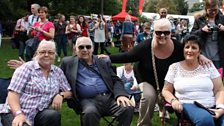 Spectators enjoying the Mela