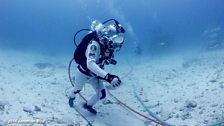 NASA astronaut trains underwater as part of the NEEMO project.