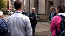 Raymond O’Regan leads a walking tour about Belfast