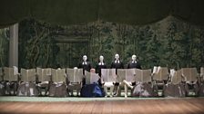 Sarah Tynan as Romilda with the English National Opera Chorus