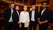 Jessie Ware poses with her band