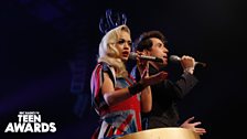 Rita and Grimmy enter the arena