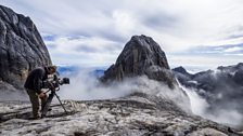 Mt.Kinabalu. Cameraman Richard Kirby captures the building clouds on Borneo’s highest peak