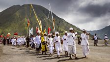 Tenggerese people begin the Kasada festival at the base of Mt. Bromo, an active volcano