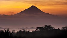 Merapi Volcano at dawn, Java. Thousands of volcanoes are found across the islands of the malay archipelago in SE Asia.