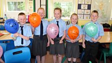 The five with their finished balloons