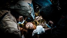 An infant Sumatran orangutan has a medical check