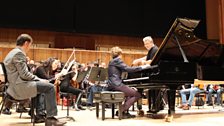 Pavel Kolesnikov with Vassily Sinaisky rehearsing Rachmaninov