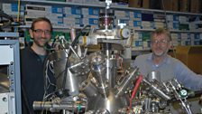 Iggy McGovern (right) and presenter Greg Tate and the X-ray Photoelectron Spectrometer.