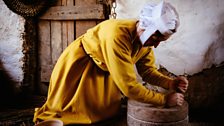 Ruth uses a stone quern to grind wheat and barley into flour, flour was too expensive for workers to buy ready-made