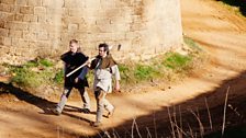 Tom Pinfold and Peter Ginn walking round the castle walls