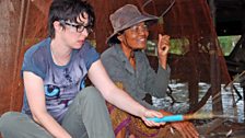 Sue helps out with the catch on Tonle Sap Lake, SE Asia's biggest freshwater lake.