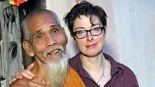 Sue with a hermit on the banks of the Mekong, Cambodia. 