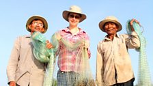 Sue with Mekong fishermen, Cambodia.