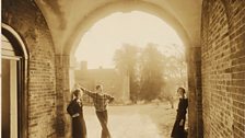 Nancy, Cecil and Baba Beaton under the Archway, 1931