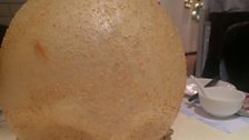 A giant fried sesame ball