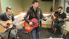 James Blunt and his band sing live in the studio