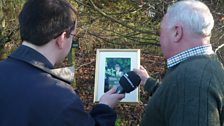 Chris shows off a picture taken at the woodland by a local photographer