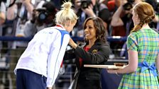 Lynsey receiving her medal from Dame Kelly Holmes