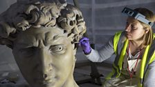 Conservator Johanna Puisto works on the cast of Michelangelo's David, June 2014 in the Weston Cast Court