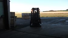 Stefyn at work on the Forklift