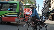 Yangon rickshaw rider peddles his trade