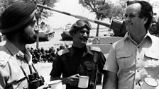 Sir Mark Tully with members of the Indian armed forces.