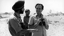 Sir Mark Tully with members of the Indian armed forces