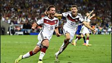 Mario Gotze and Thomas Muller celebrate