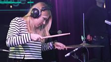 Charli XCX's drummer in the Live Lounge