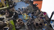 Abandoned boots outside the pub