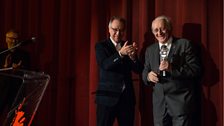 Festival director Dieter Kosslick awards film historian Naum Kleiman the 'Berlinale Kamera'