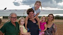 Saba, Frank and Iain with the children by the Save the Elephants plane